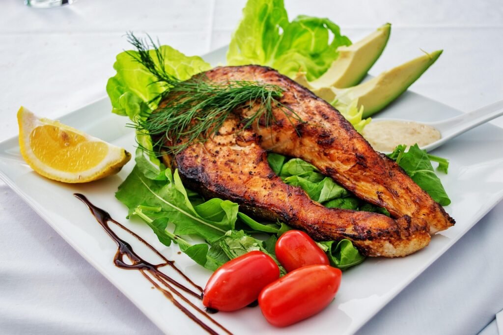 salmon, fish, grilled fish, grill, dish, gourmet, plate, white, avocado, lettuce, tomato, lemon, olive oil, nature, balsamic, meal, food, delicious, dinner, cuisine, lunch, tasty, meat, cooked, seafood, healthy, restaurant, roasted, diet, vegetable, prepared, steak, salad, fillet